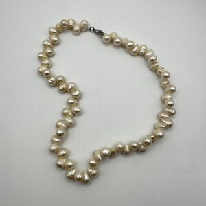 16" of all 10mm (ish) freshwater pearl necklace with silver tone metal hardware!